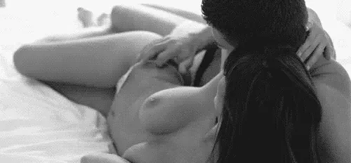 Laying next to her, your bare chest against her back, you run your hands up and down her body, caressing every inch of her. 