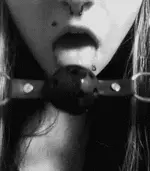 Put on a ball gag