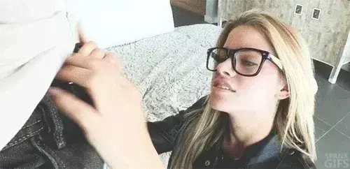 You remove his pants and boxer shorts, making his hard cock pop out from under the hood! 