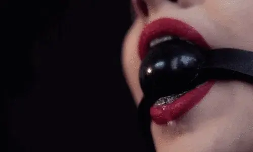 You put a ball gag on her so now all she can do is moan and drool drip over her tits.